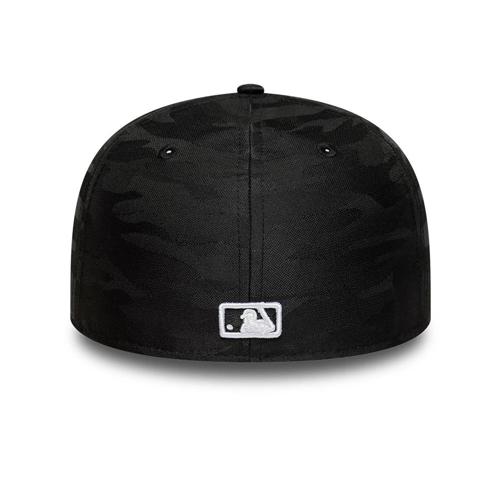 New York Yankees MLB Black Camo New Era 59FIFTY Fitted Cap, rear view showing the white embroidered MLB Batterman logo centred on the black camo-patterned back panels, with a structured crown and black stitching details.