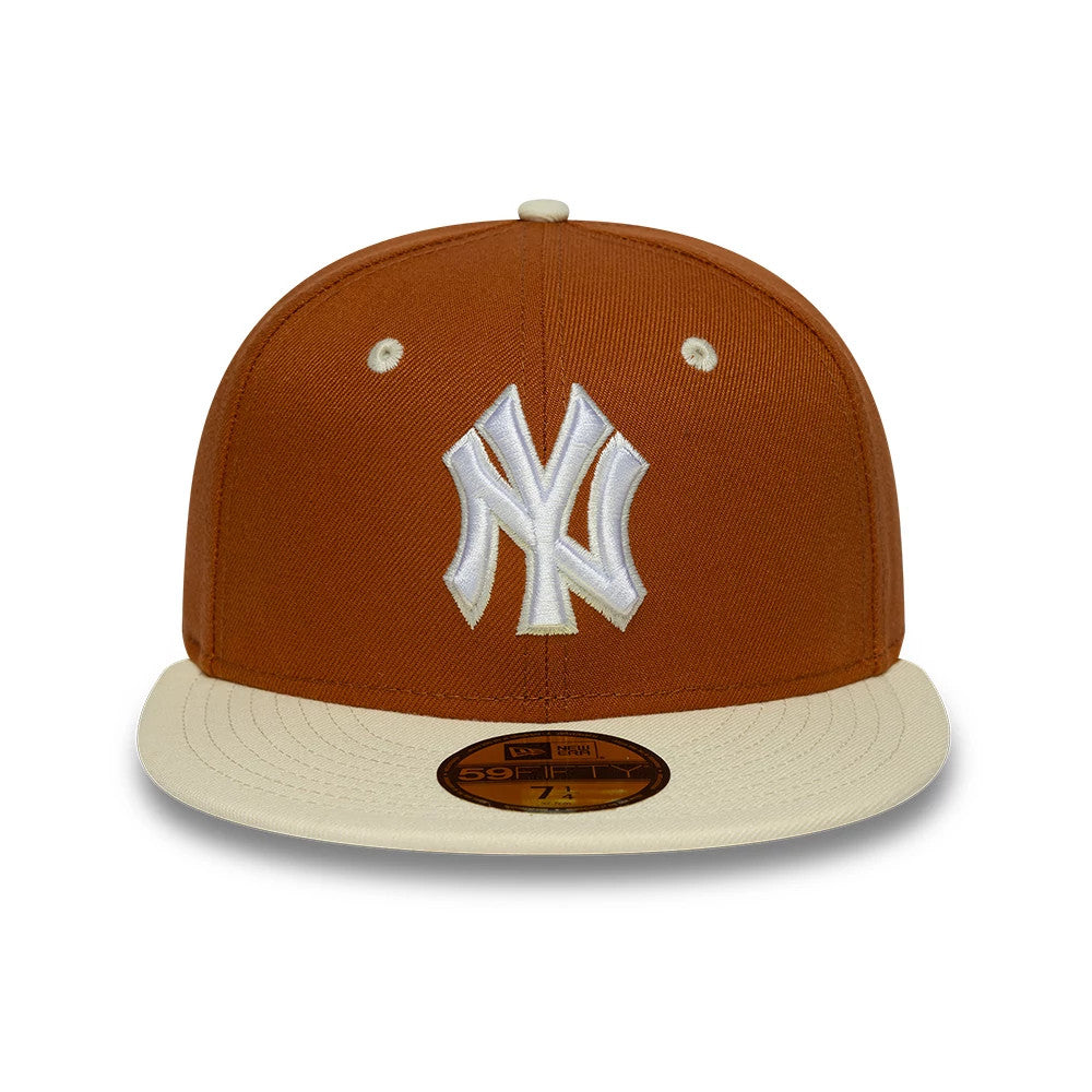 New York Yankees MLB Contrast Brown New Era 59FIFTY Fitted Cap, front view showing the white raised embroidered NY logo on the brown front panel, with a cream flat visor and a gold 59FIFTY size sticker on the visor.