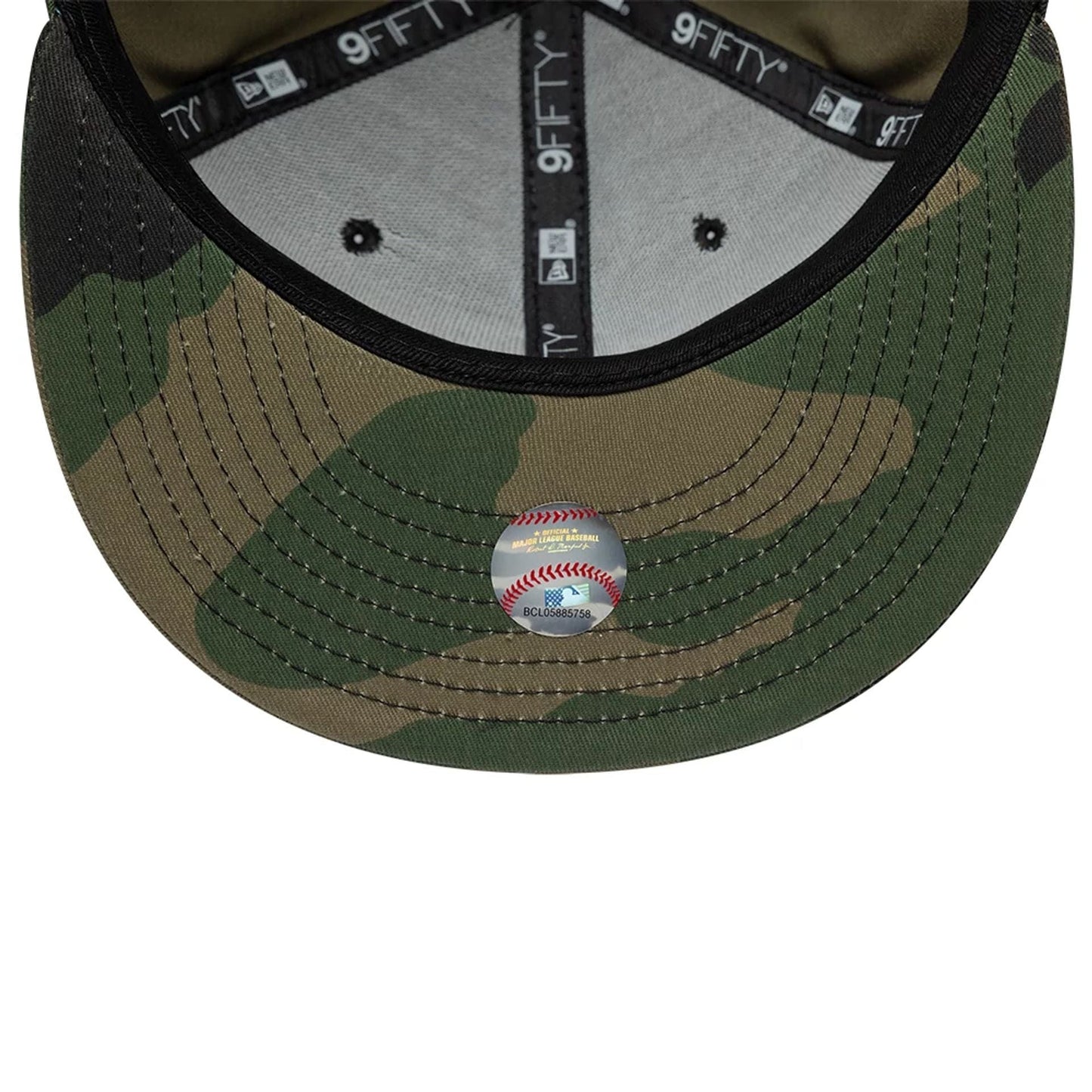 Pictured is this MLB Camo New York Yankees 9FIFTY Snapback cap in green. 7