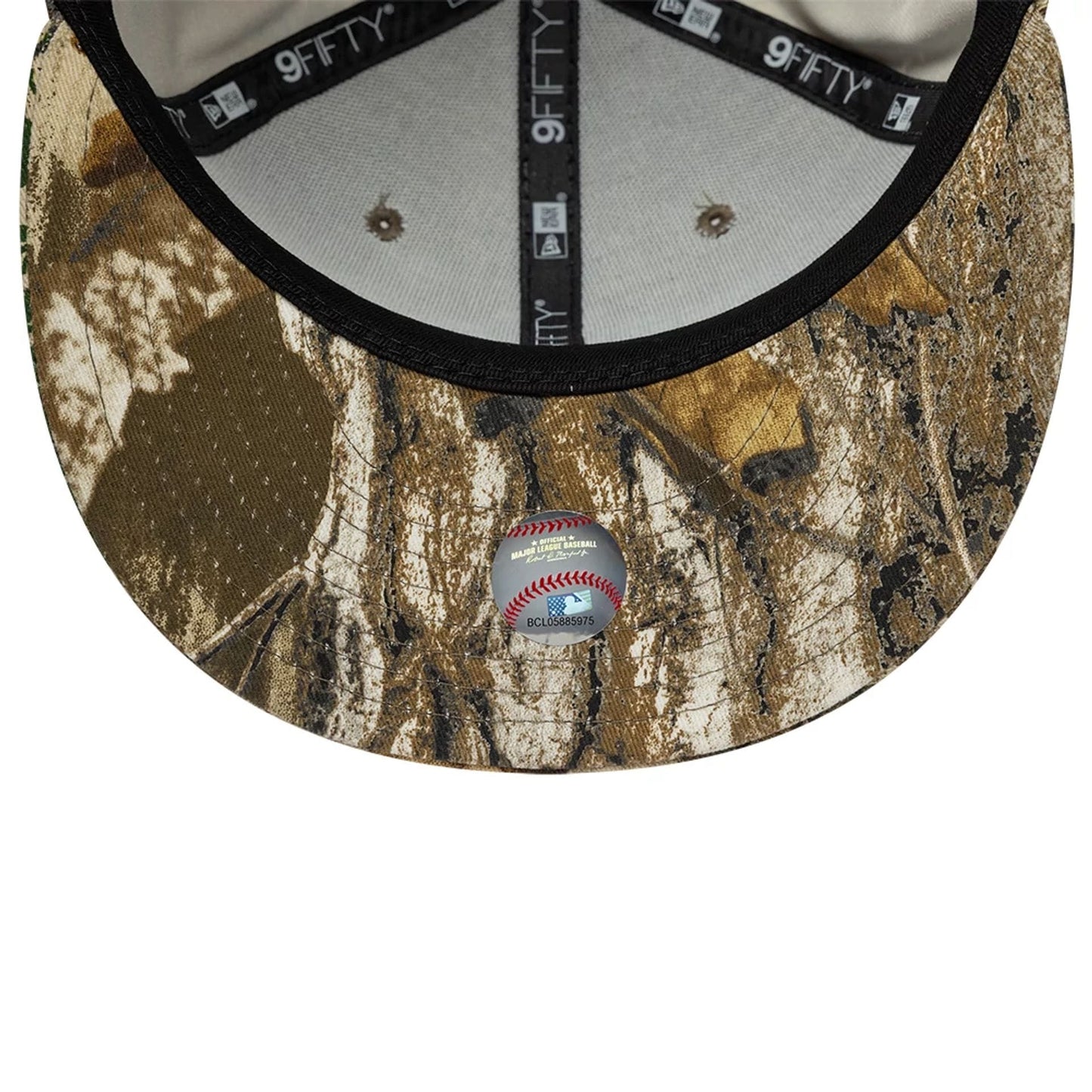 Pictured is this MLB Real Tree New York Yankees 9FIFTY Snapback cap in beige. 7