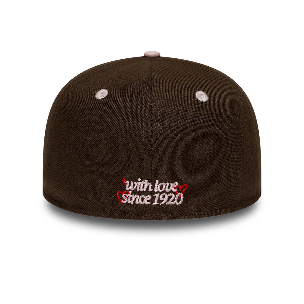 New Era With Love Dark Brown 59FIFTY Fitted Cap, rear view showing white and red embroidered text 'with love since 1920' on the centre back, with light pink top button and matching eyelets on the structured dark brown crown.