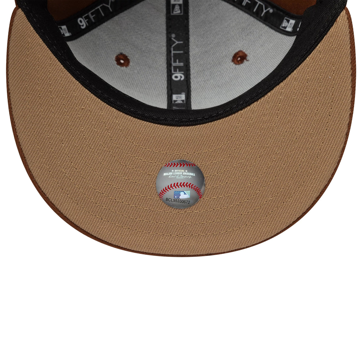 Pictured is this Youth MLB Tiramisu LA Dodgers 9FIFTY Snapback cap in brown. 2