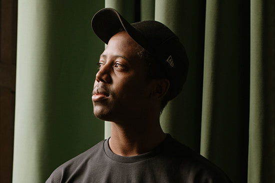 Slide 5:Mose Boyd wearing New Era's Detroit Tigers collection: cap and t-shirt.