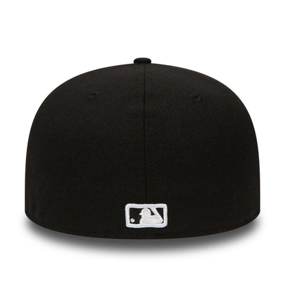 New York Yankees Essential Black New Era 59FIFTY Cap, rear view showing the white embroidered MLB Batterman logo centred on the back of the black structured crown, beneath the top button.