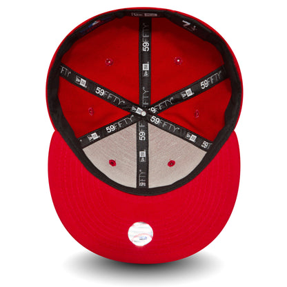 New York Yankees Essential Red New Era 59FIFTY Cap, inside view showing black 59FIFTY taping on red panels with a grey undervisor, a black sweatband, and the size sticker on the undervisor.