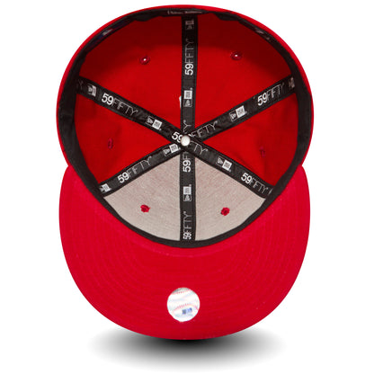 LA Dodgers Essential Red New Era 59FIFTY Cap, inside view showing black 59FIFTY taping across the crown, red eyelets, a white top button, and the 59FIFTY size sticker on the red undervisor.