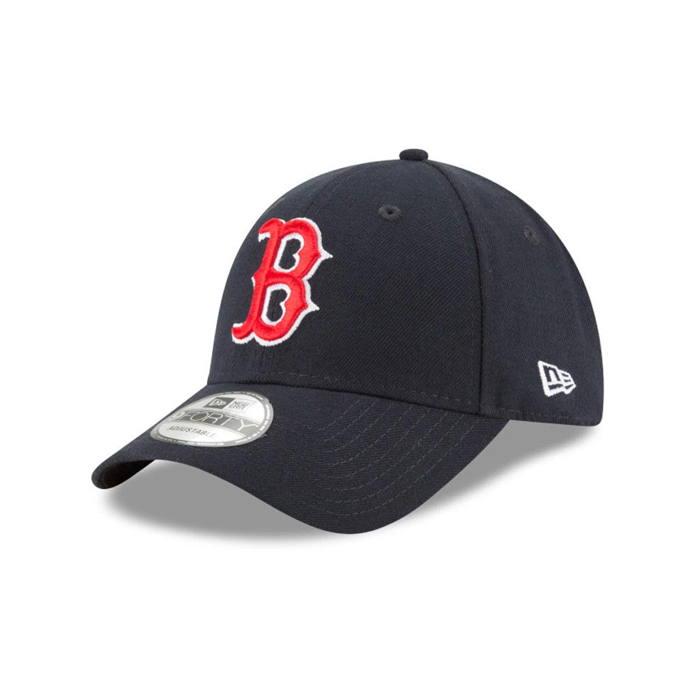 Boston Red Sox The League Blue New Era 9FORTY Cap, three-quarter view showing the raised red and white embroidered B logo on the front panel, curved visor with a 9FORTY size sticker, and the New Era flag logo on the left side.