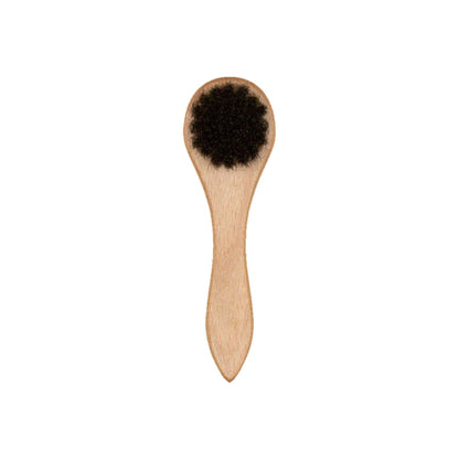 This is a New Era Wooden Cap Brush 2