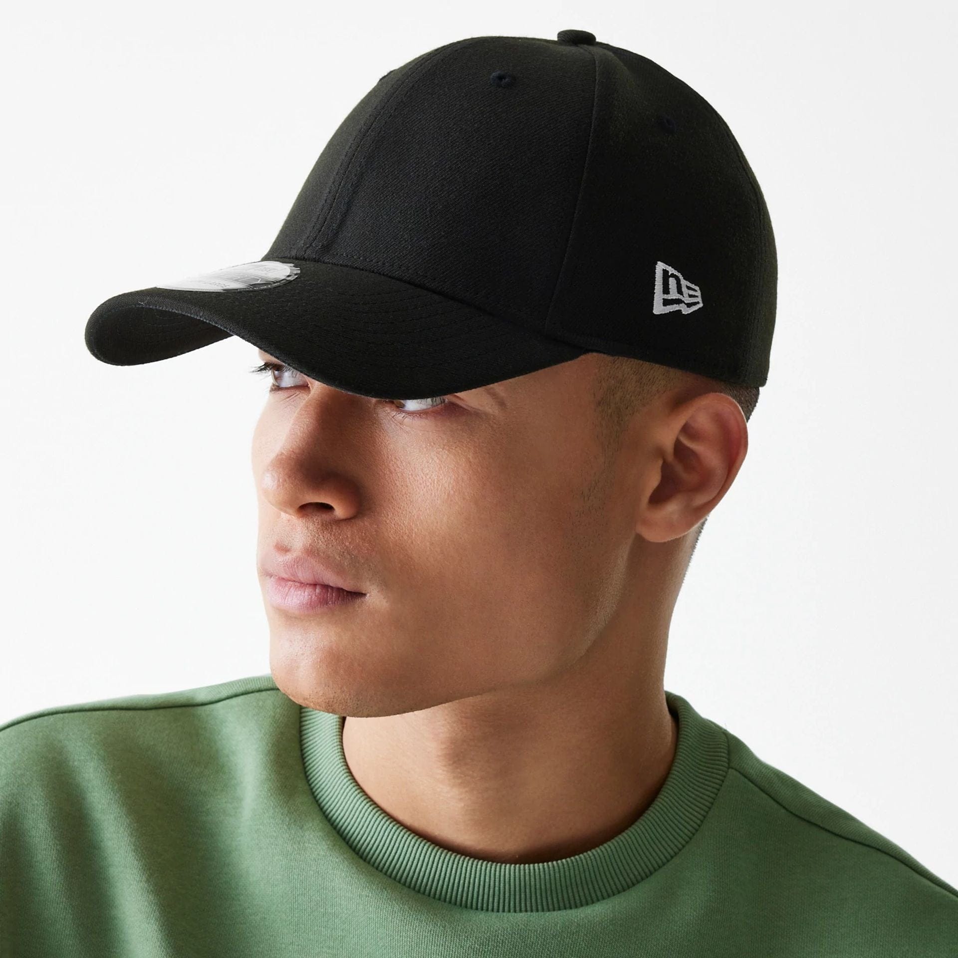 This is a New Era Flag Black 39THIRTY Cap 5