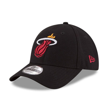 Miami Heat The League Black New Era 9FORTY Cap, three-quarter view showing the red and yellow team logo in raised embroidery on the front panel, with a curved black visor and 9FORTY size sticker, plus the New Era flag logo on the left side.