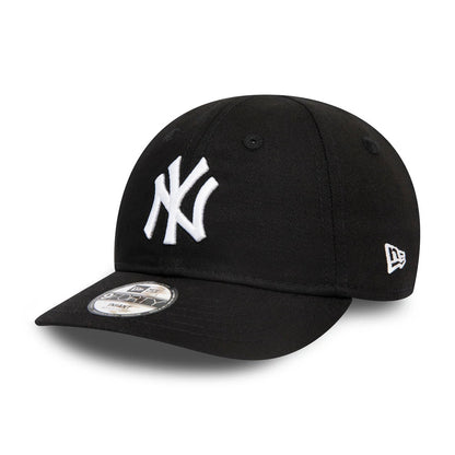 New York Yankees Essential Infant Black New Era 9FORTY Cap, three-quarter view showing raised white NY logo embroidered on the front panel, black curved visor with a 9FORTY size sticker, and New Era flag logo on the left side.