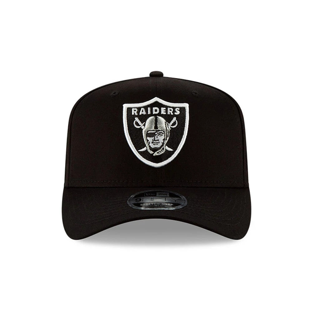 NFL Las Vegas Raiders Black New Era 9FIFTY Stretch Snap Cap, front view showing the raised white Raiders emblem embroidered on the black crown above the 9FIFTY size sticker on the curved visor.