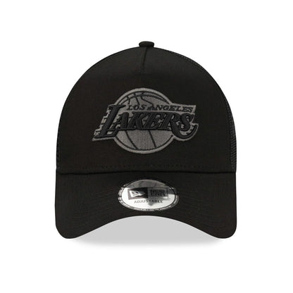LA Lakers Tonal Black New Era A-Frame Trucker Cap, front view showing the raised grey LA Lakers logo on the front panel with a black curved visor and a 9FORTY size sticker at the centre.