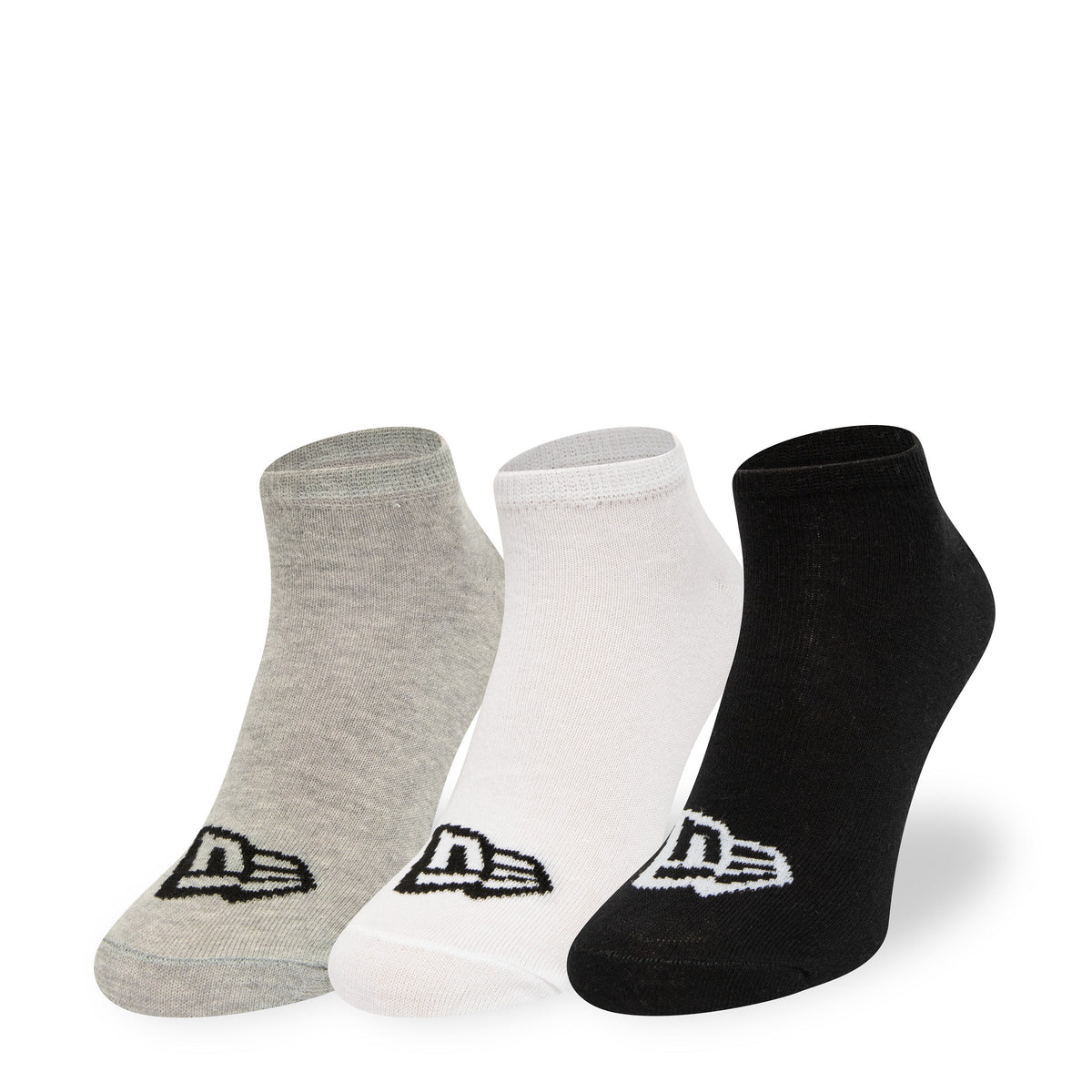 New Era Flag 3 Pack Grey, White and Black Socks, front view showing three socks in grey, white, and black with a raised New Era logo positioned near the toe area, each sock standing upright in a row.