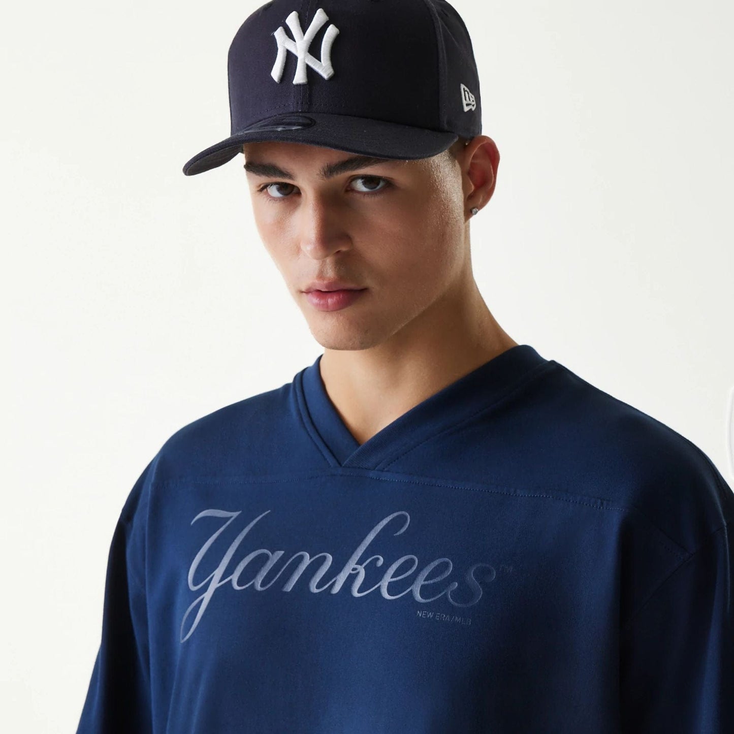 The Male model is wearing New York Yankees Tonal Pack Blue T-Shirt 4