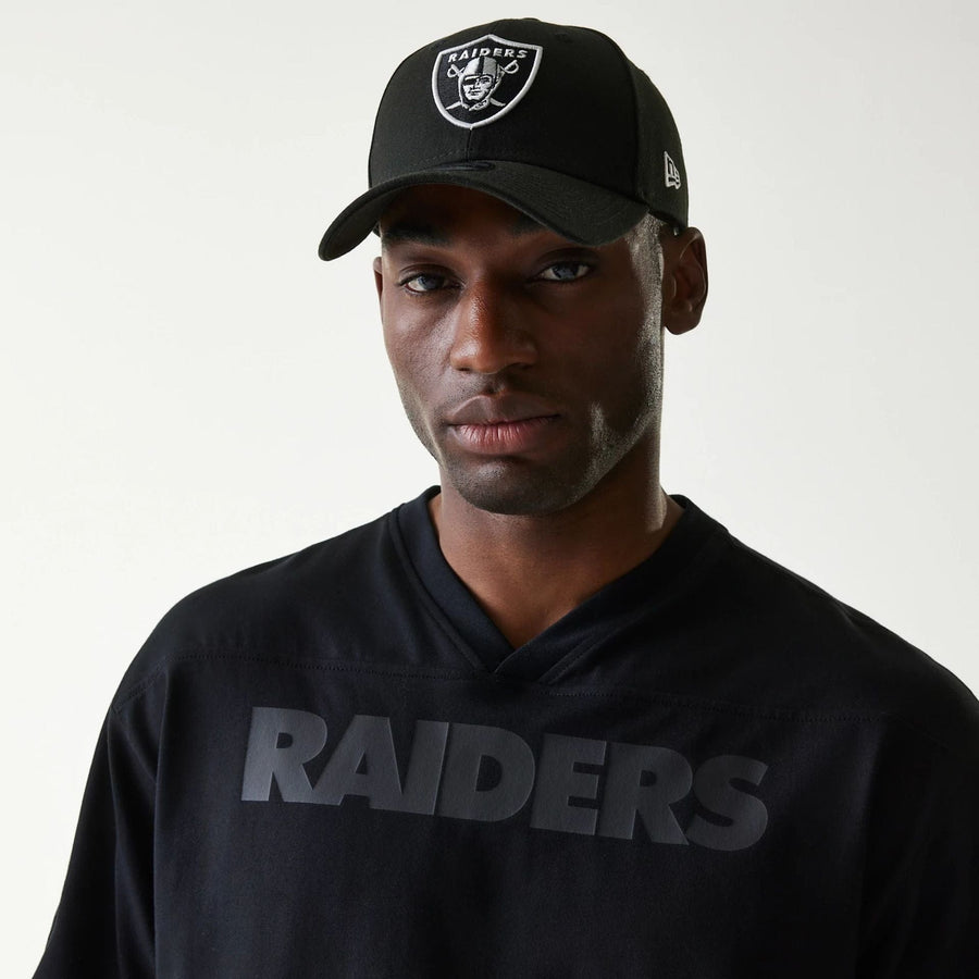 The Male model is wearing Las Vegas Raiders Tonal Pack Black T-Shirt 4