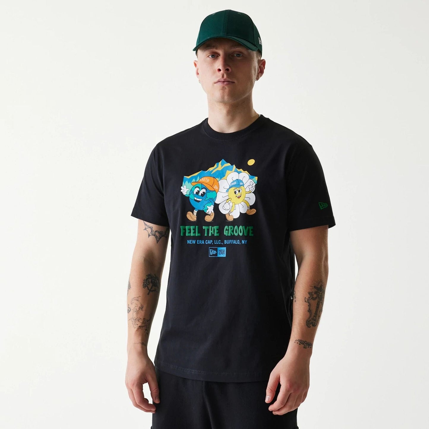 The Male model is wearing New Era Outdoor Earth Day Black T-Shirt 1