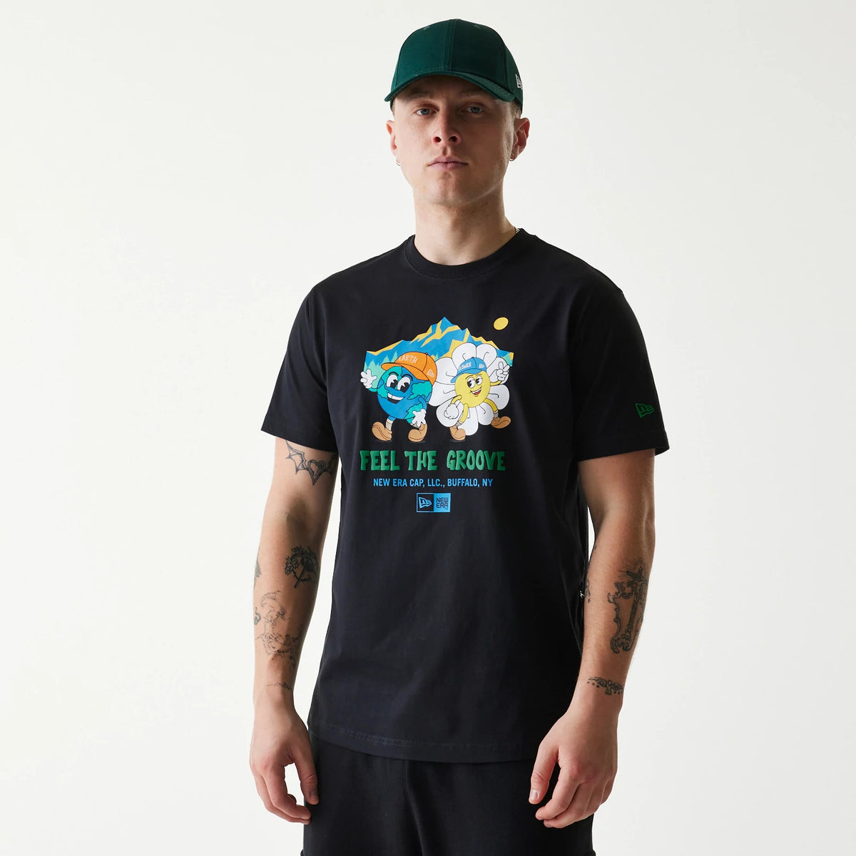 The Male model is wearing New Era Outdoor Earth Day Black T-Shirt 6