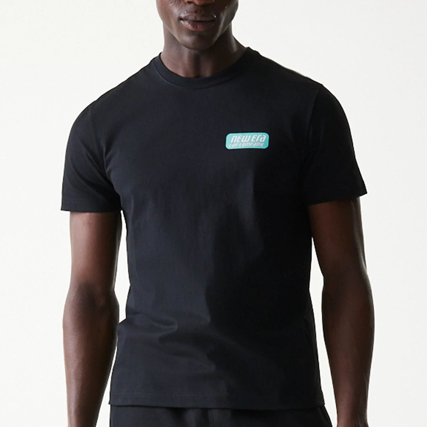 The Male model is wearing New Era Classic Black T-Shirt 3