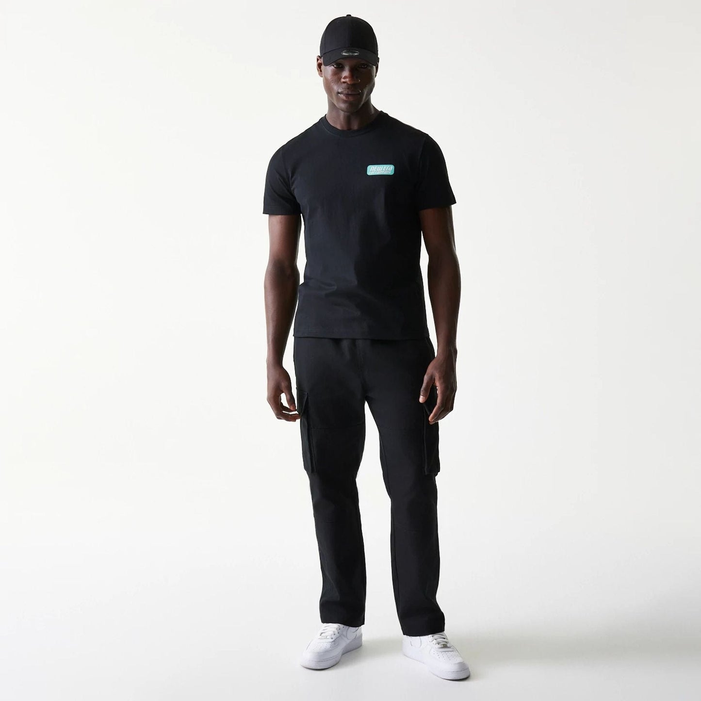 The Male model is wearing New Era Classic Black T-Shirt 8