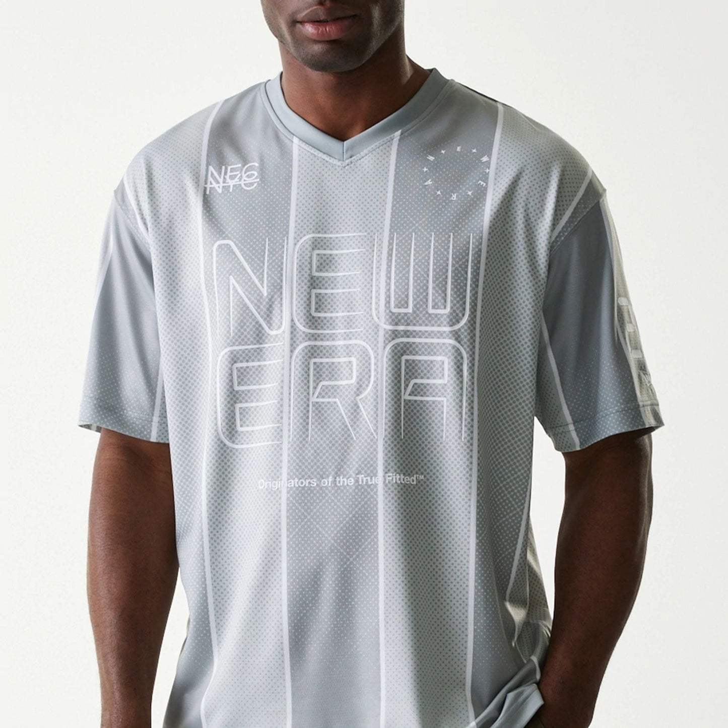 The Male model is wearing New Era City Sport Grey T-Shirt 3