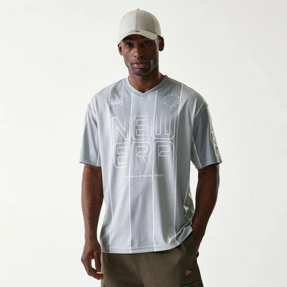The Male model is wearing New Era City Sport Grey T-Shirt 1