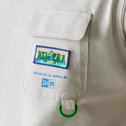 The Male model is wearing New Era Outdoor Earth Day Stone T-Shirt 4