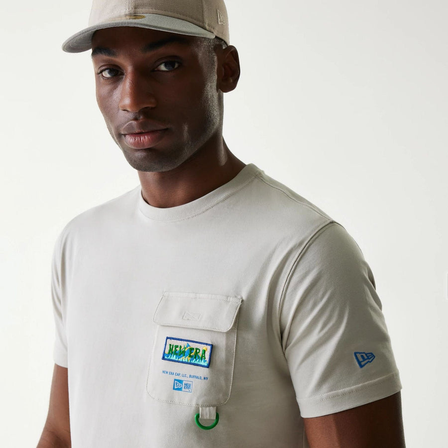 The Male model is wearing New Era Outdoor Earth Day Stone T-Shirt 5