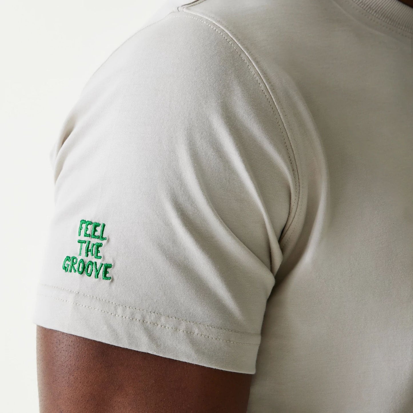 The Male model is wearing New Era Outdoor Earth Day Stone T-Shirt 6
