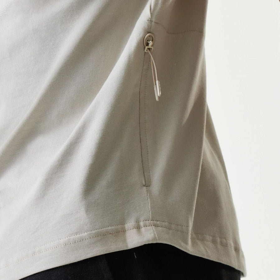 The Male model is wearing New Era Outdoor Earth Day Stone T-Shirt 7