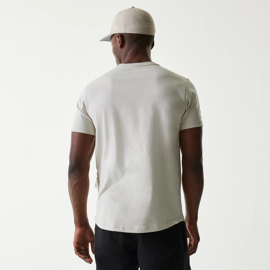 The Male model is wearing New Era Outdoor Earth Day Stone T-Shirt 2