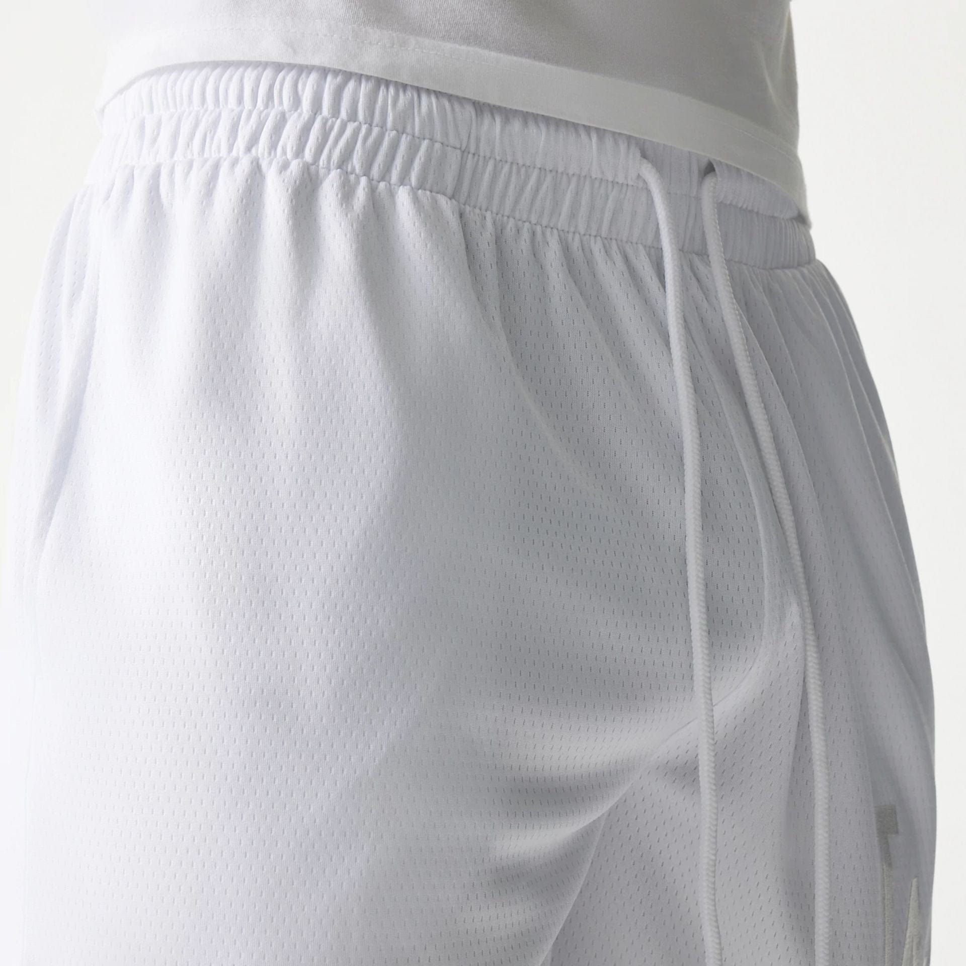 The Male model is wearing LA Dodgers Tonal Pack White Shorts 7