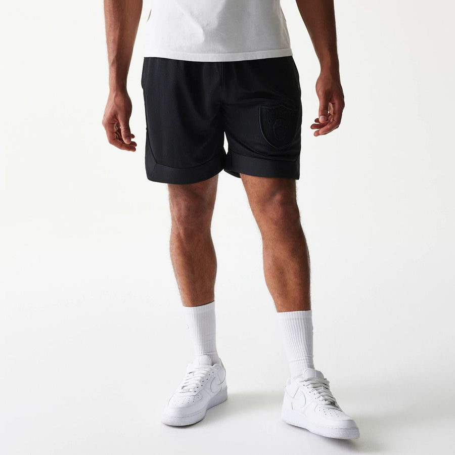 The Male model is wearing Las Vegas Raiders Tonal Pack Black Shorts 6