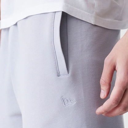 The Male model is wearing New Era Tonal Pack Grey Shorts 4