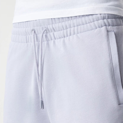 The Male model is wearing New Era Tonal Pack Grey Shorts 6