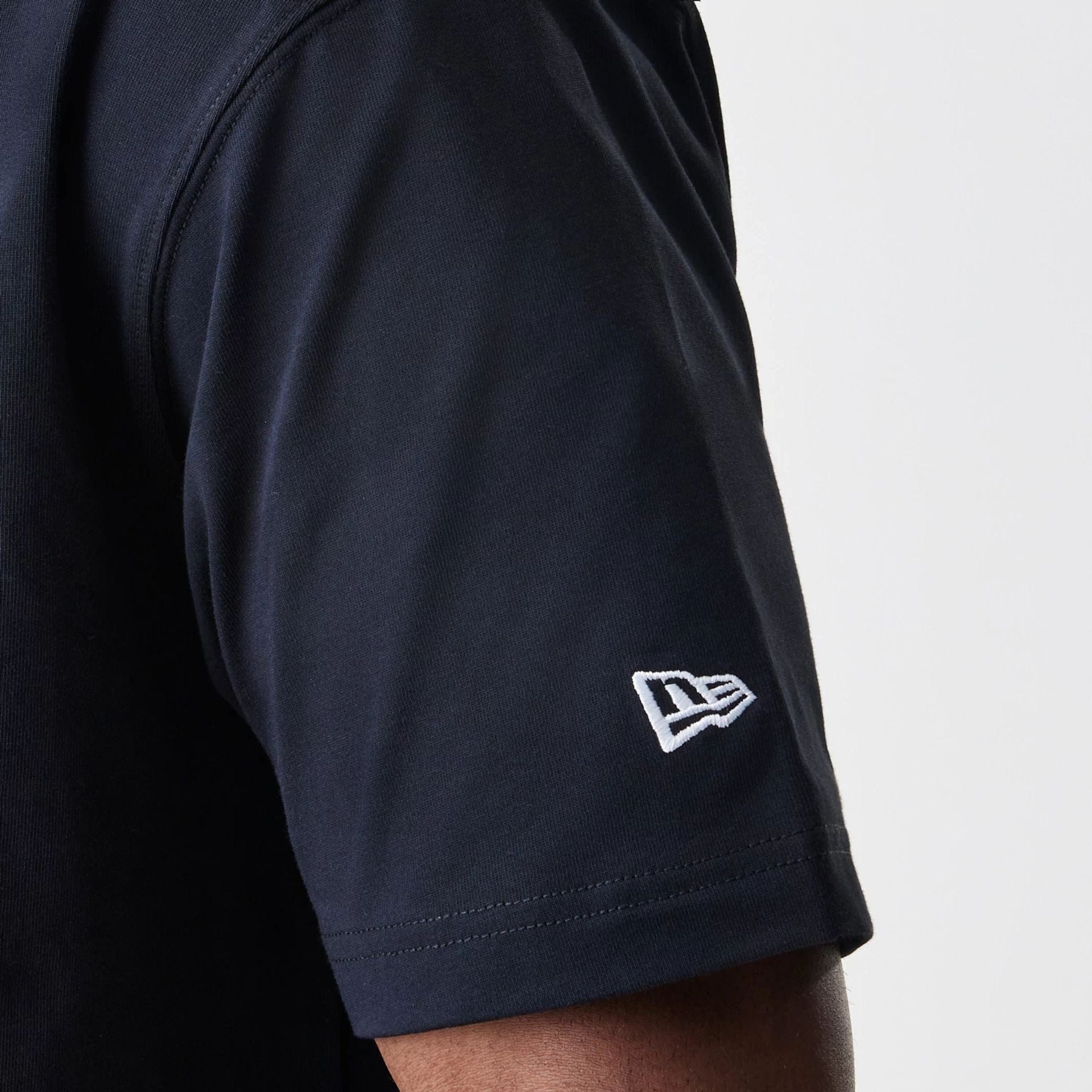 The Male model is wearing San Francisco 49ers NFL Black Oversized T-Shirt 4