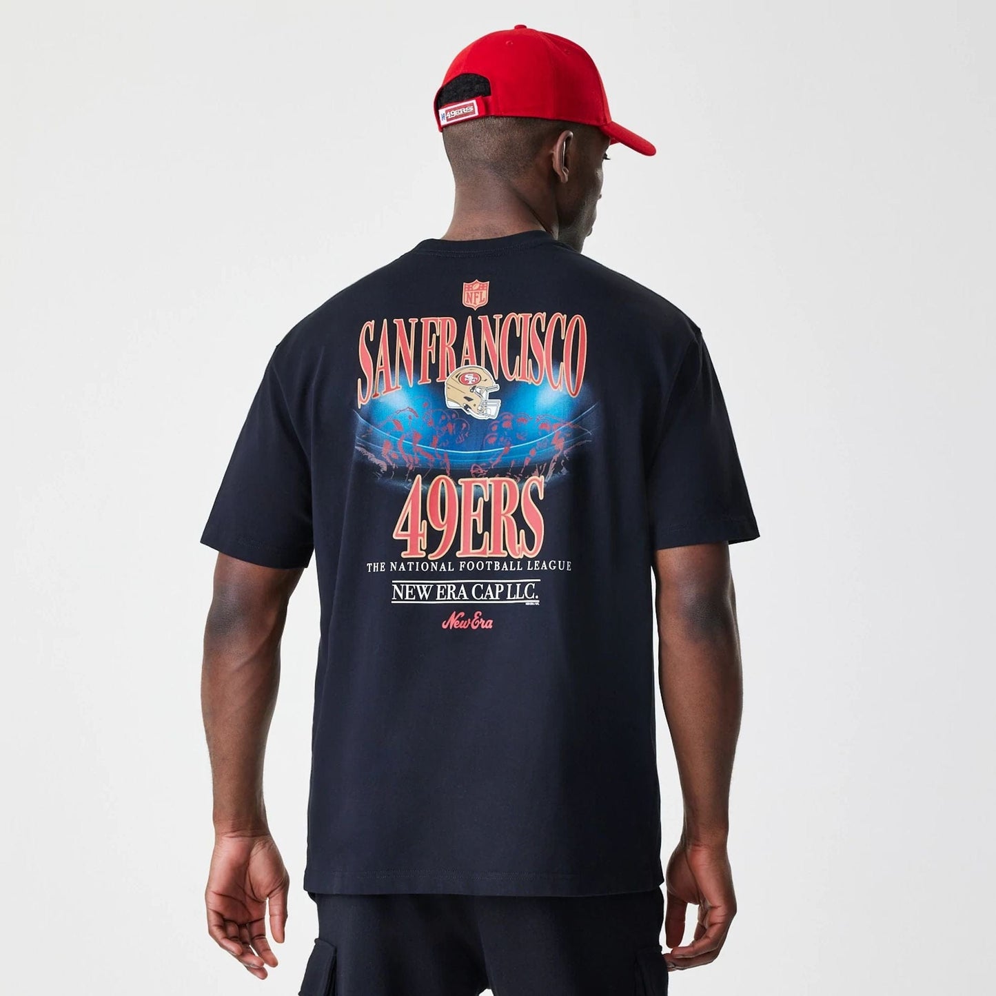 The Male model is wearing San Francisco 49ers NFL Black Oversized T-Shirt 2