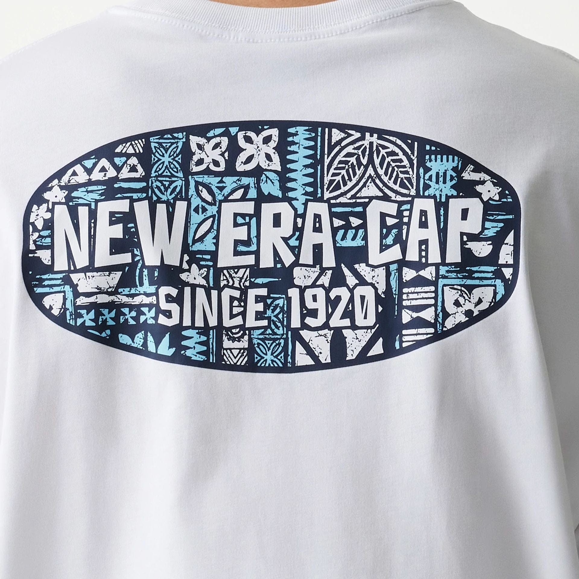 The Male model is wearing New Era Marine Life Club White Oversized T-Shirt 4