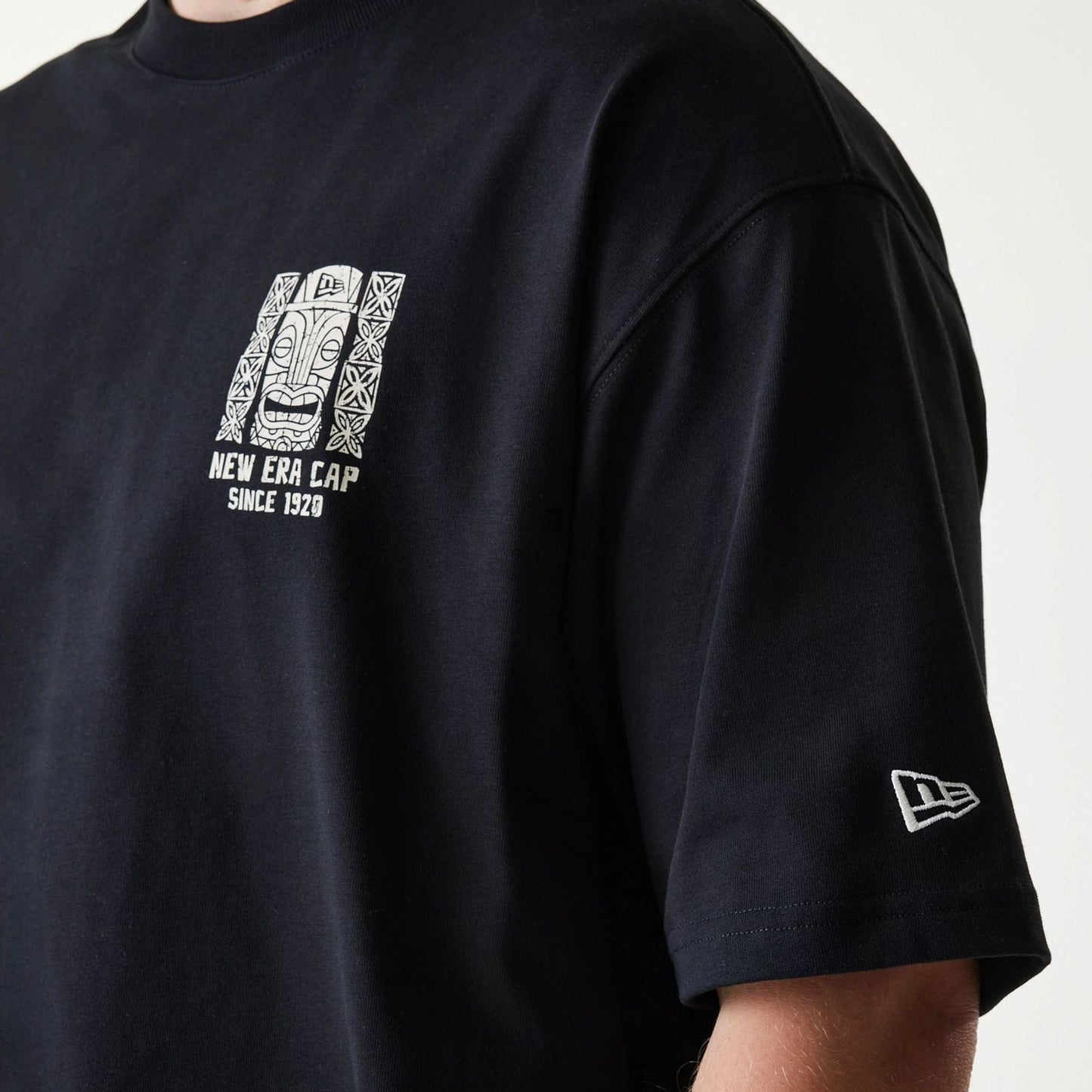 The Male model is wearing New Era Marine Life Club Black Oversized T-Shirt 3