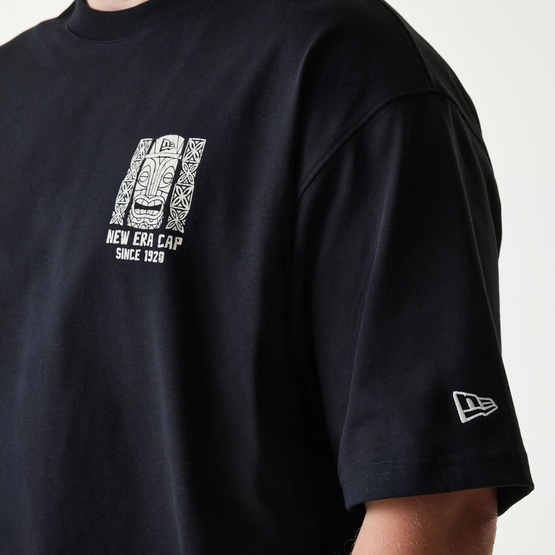 The Male model is wearing New Era Marine Life Club Black Oversized T-Shirt 3