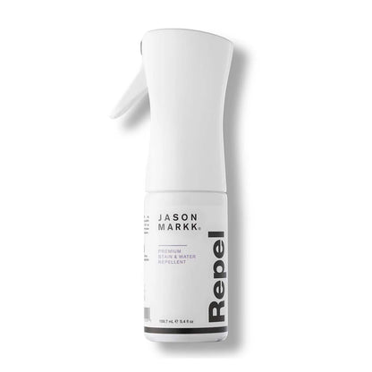 Jason Markk® Repel Spray, side view showing a sleek white bottle with the Jason Markk logo and "Repel" text in bold letters vertically, featuring a trigger spray nozzle designed for easy application.