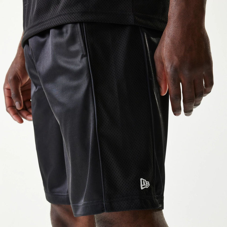 The Male model is wearing New Era Retro Sports Black Mesh Shorts 7