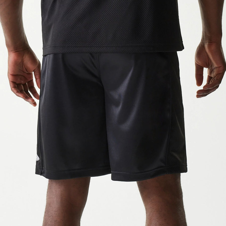 The Male model is wearing New Era Retro Sports Black Mesh Shorts 5