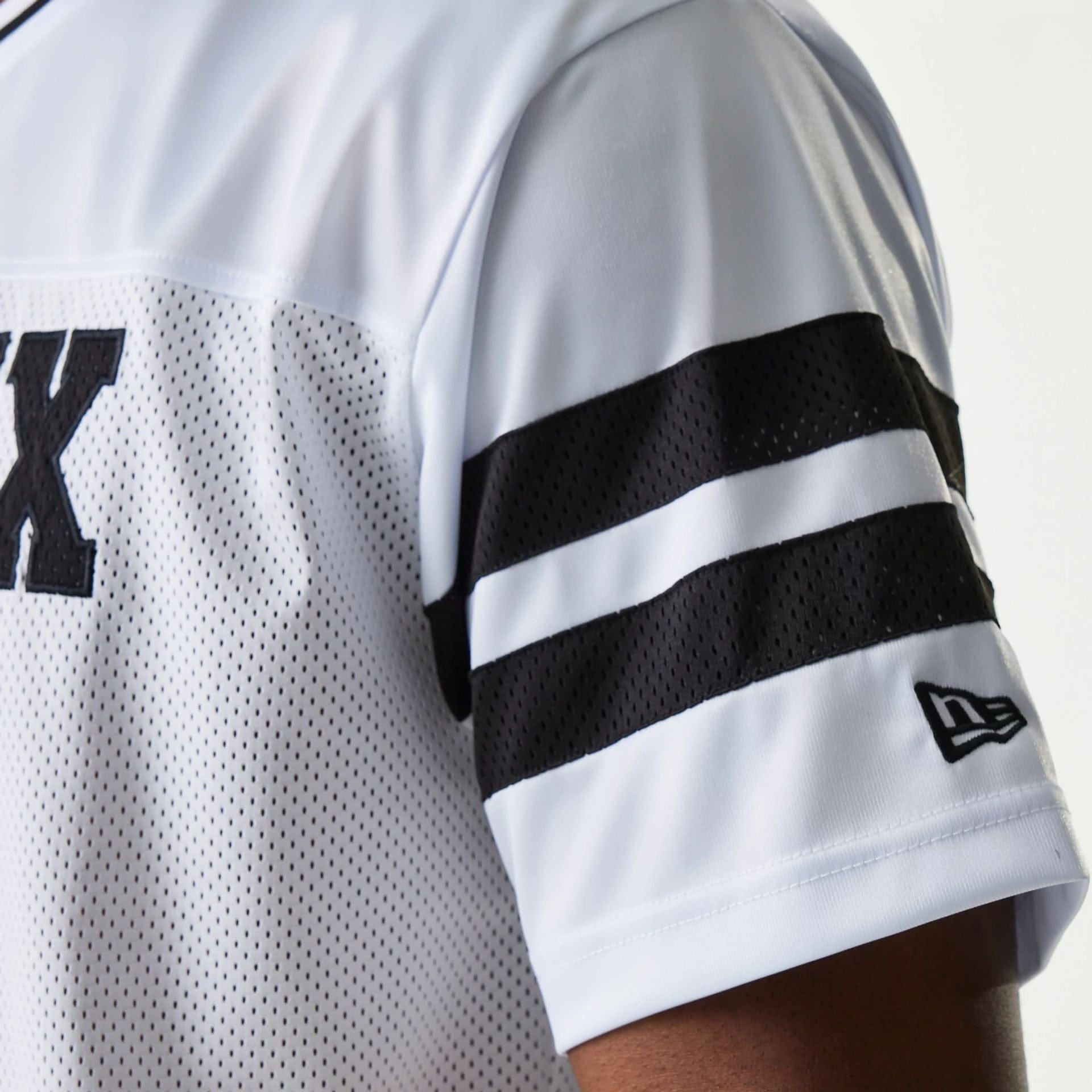 The Male model is wearing New Era Retro Sports White Mesh Jersey 6