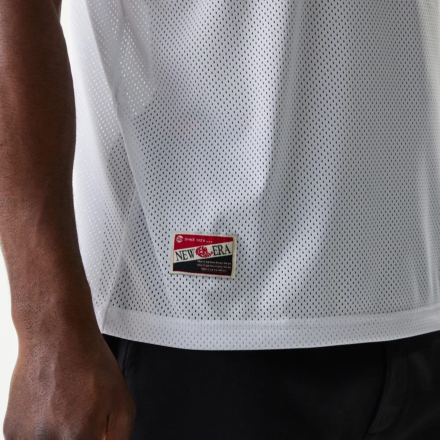 The Male model is wearing New Era Retro Sports White Mesh Jersey 4