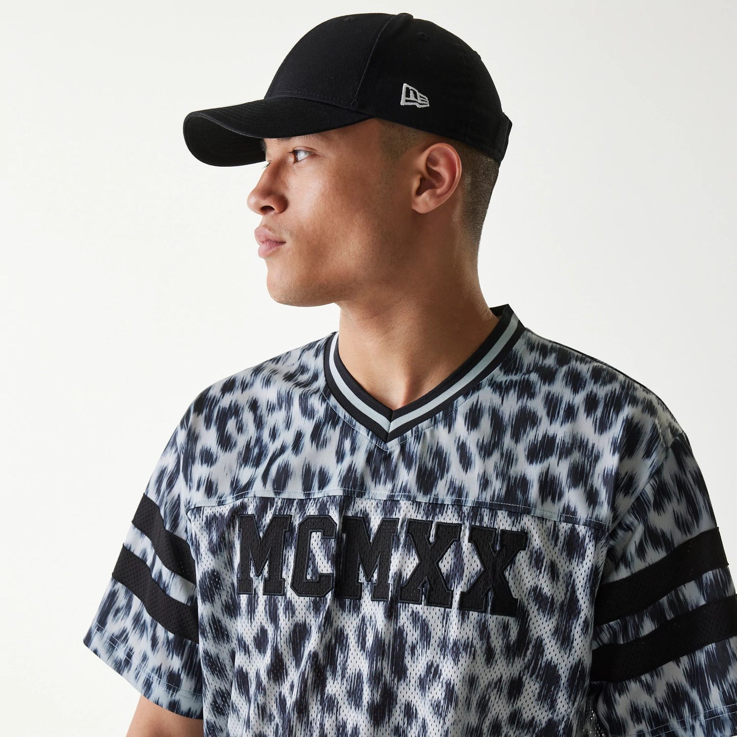 The Male model is wearing New Era Retro Sports Grey Mesh Jersey 6