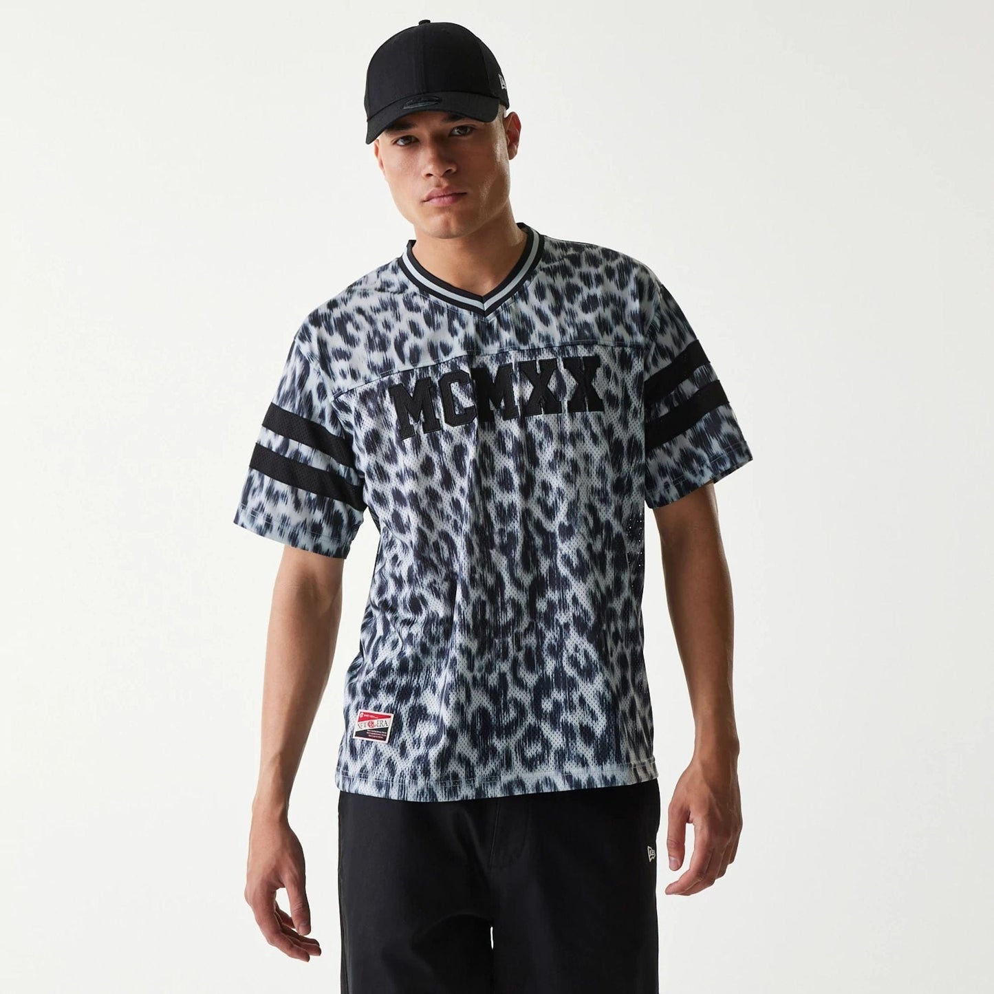 The Male model is wearing New Era Retro Sports Grey Mesh Jersey 1