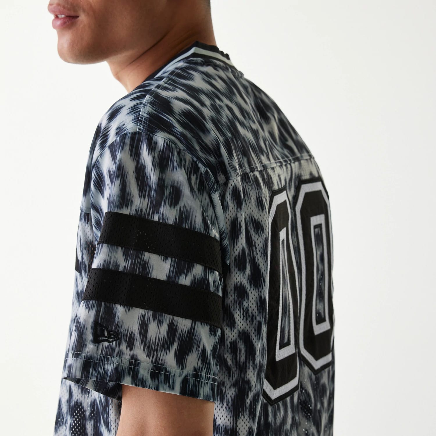 The Male model is wearing New Era Retro Sports Grey Mesh Jersey 5