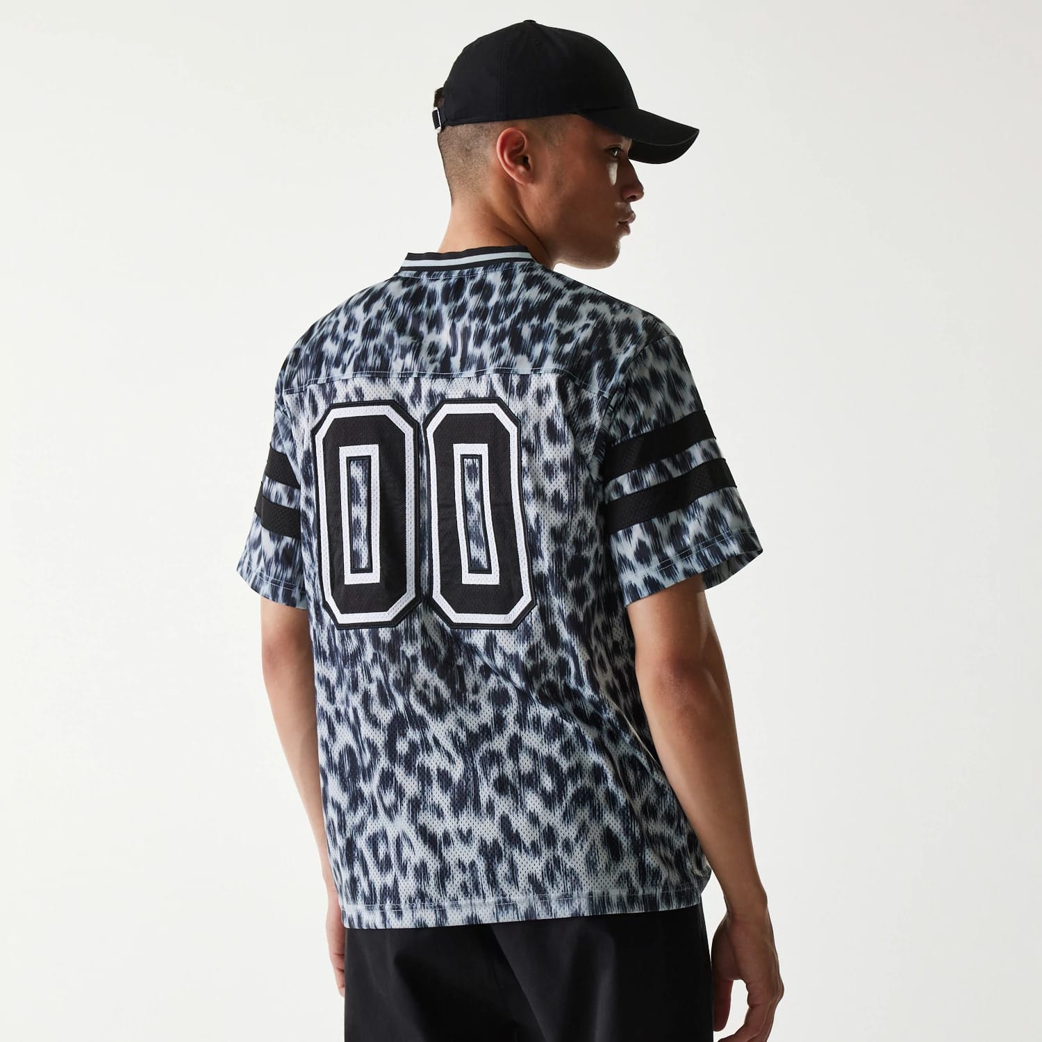 The Male model is wearing New Era Retro Sports Grey Mesh Jersey 2