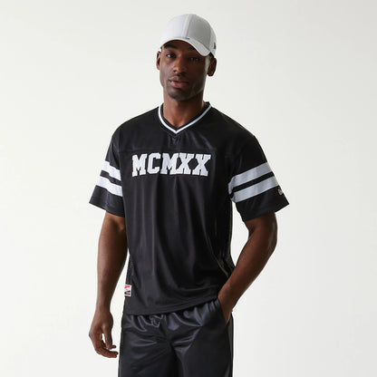 The Male model is wearing New Era Retro Sports Black Mesh Jersey 7